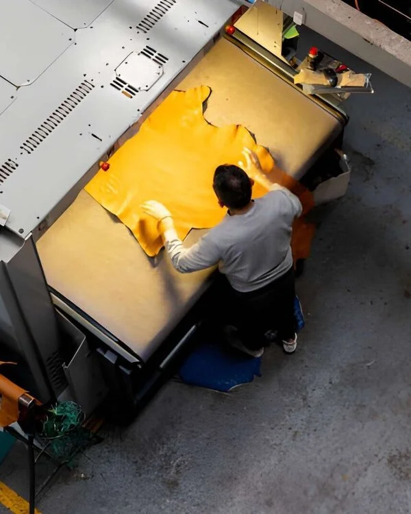 Men Doing Work in Schott Leather Factory on Laser Cutting Machine