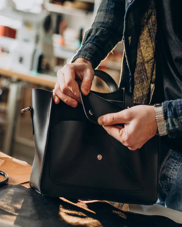 Worker Quality Checking Leather Tote Bag by Schott Leather
